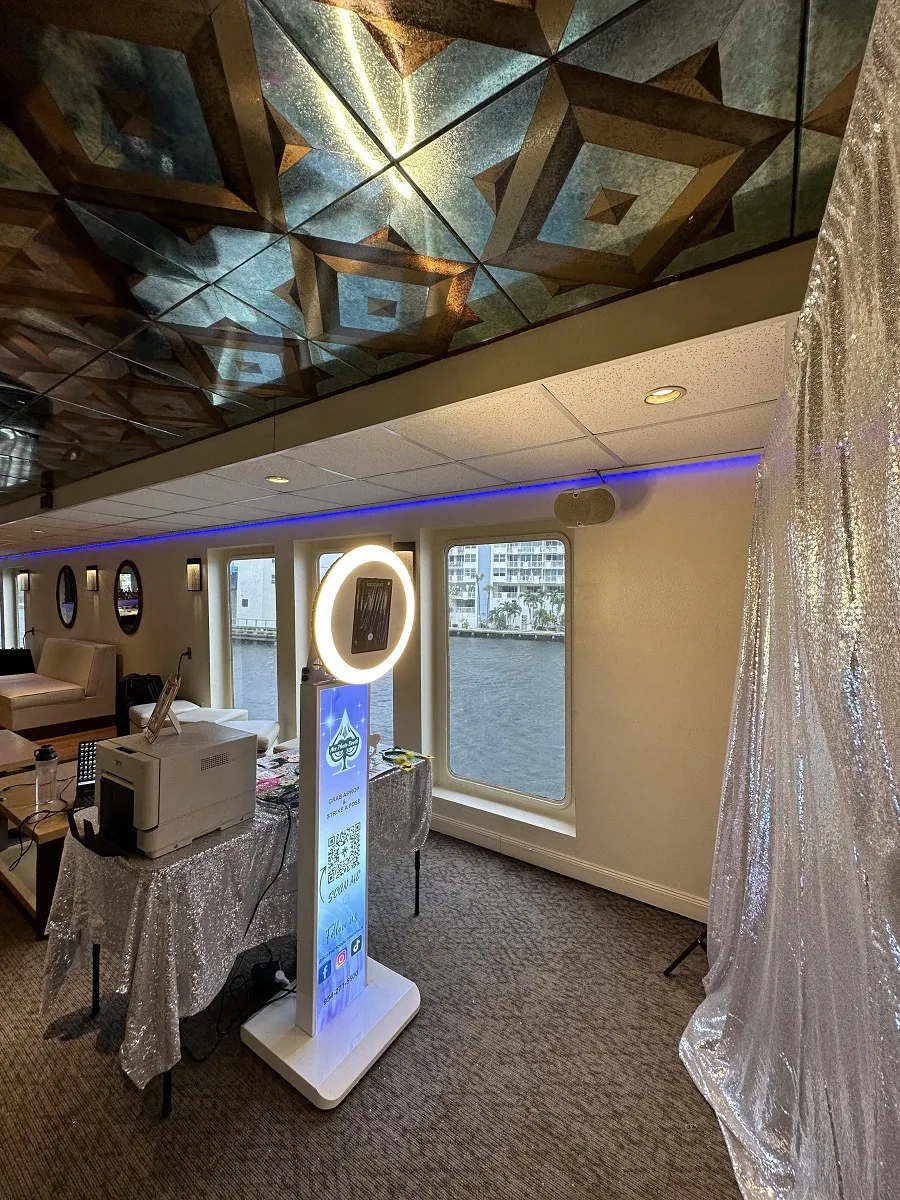 Ring-light photo booth set up in a mirrored event room